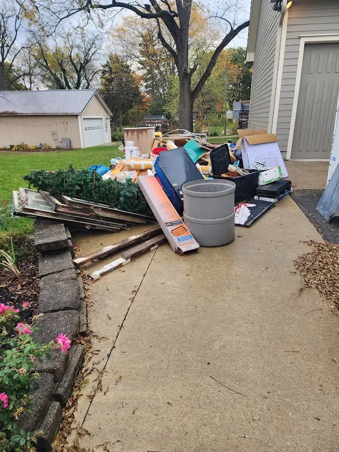 Dumpster being loaded with debris for 3 Yard Dumpster Rental in Cambrian Park
